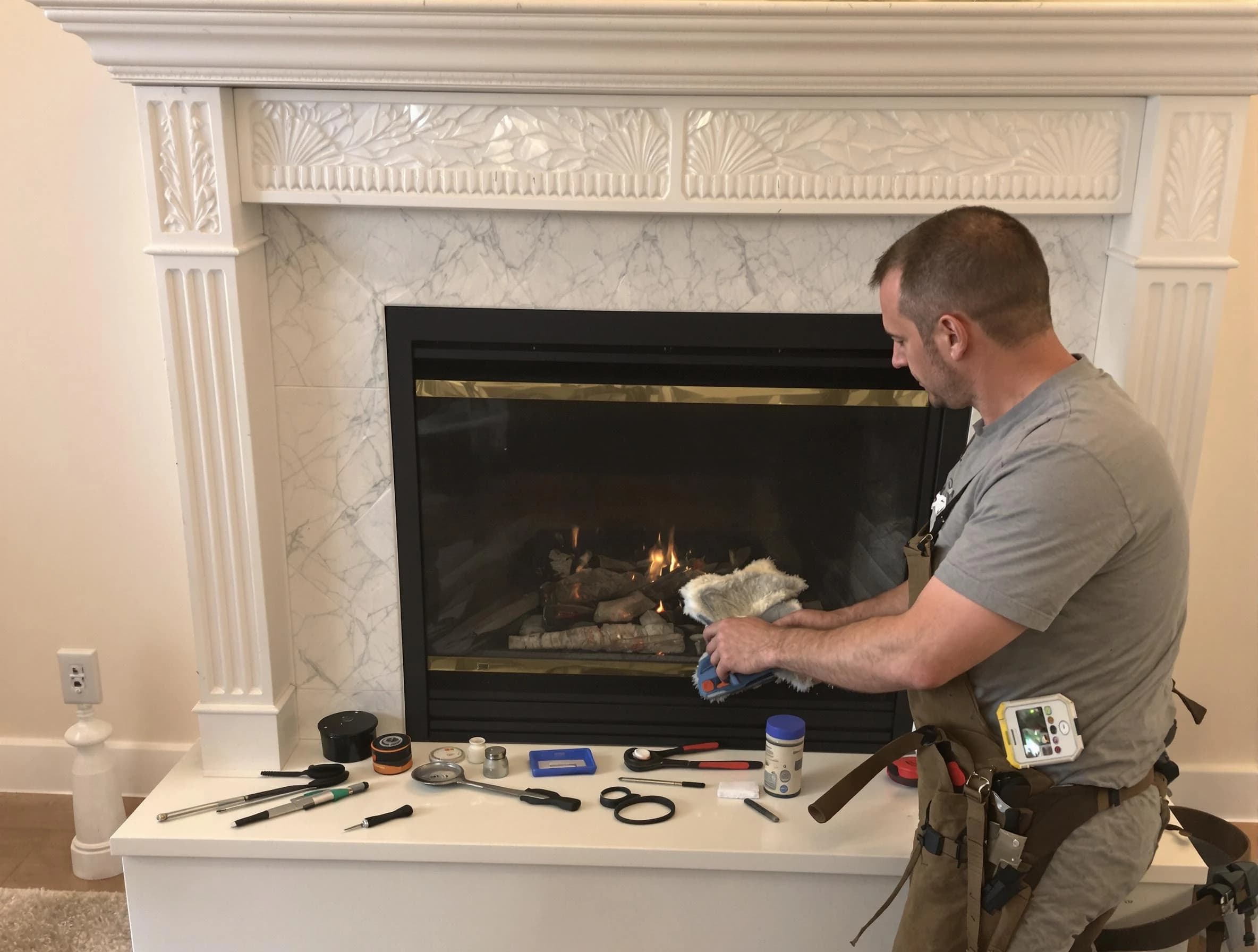Lexington Chimney Sweep performing fireplace maintenance in Lexington, MA